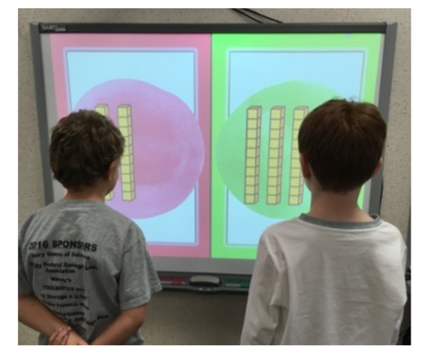 place value of a number game shown: 2 players facing off to answer first